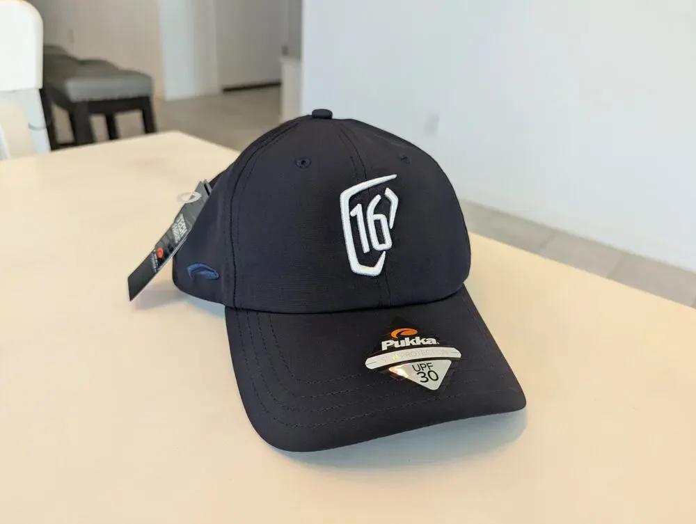 NWT Pukka WM Phoenix Open 16th Hole Golf Hat Navy Blue Tech Fabric UPF 30 Cap